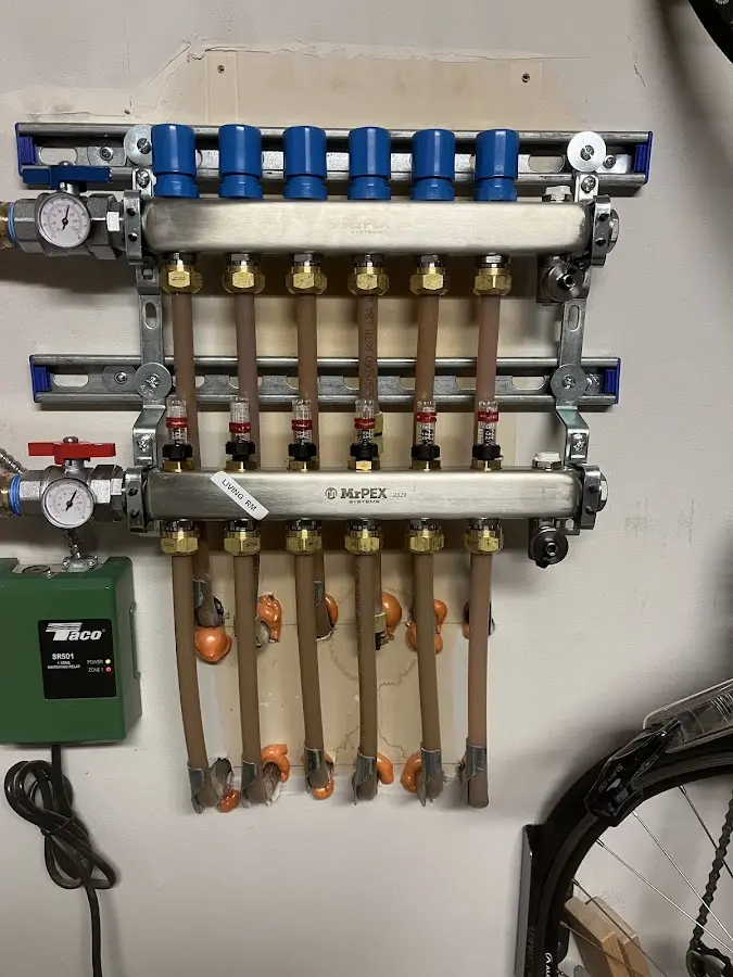 Plumber performing Water Heater Repair at a residential property in Eureka